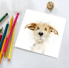 Load image into Gallery viewer, Colorful drawing of a dog on a white card with colored pencils and a sharpener on a light gray background