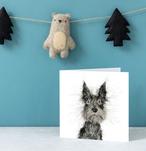 Load image into Gallery viewer, Card with a dog illustration on a blue wall with decorative items.