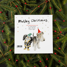 Load image into Gallery viewer, an image featuring the back of the christmas card saying Motley Christmas with two dogs in Santa hats on it.