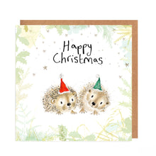Load image into Gallery viewer, Christmas card with two hedgehogs wearing party hats on a festive background.