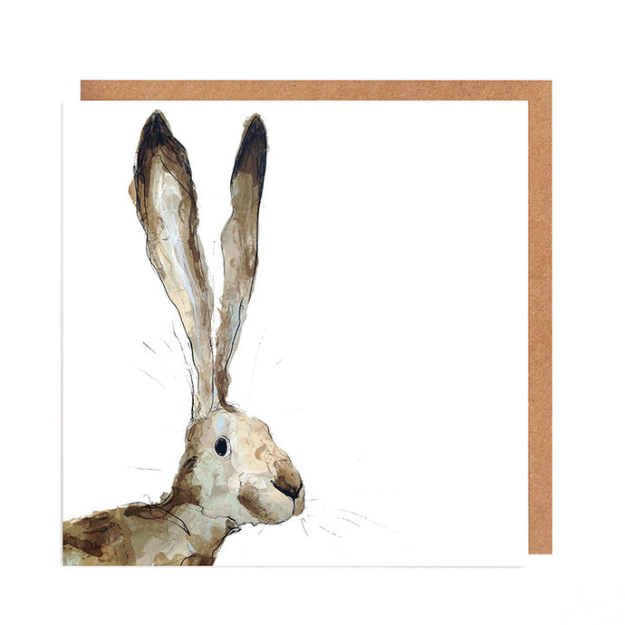 A greetings card featuring a close up  screen printed illustration of a hare, looking towards us with long ears. 
