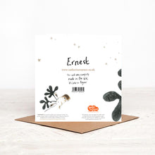 Load image into Gallery viewer, The reverse side of Ernest Moose Christmas card, featuring handwritten &#39;Ernest&#39;, gold stars and details of christmas charity partner Read for Good. 