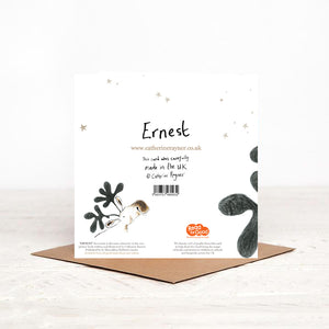 The reverse side of Ernest Moose Christmas card, featuring handwritten 'Ernest', gold stars and details of christmas charity partner Read for Good. 